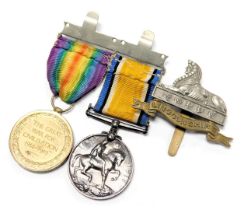 Two WWI medals, named to Pte. L R Moore, The Queen's Regiment, T-265598, comprising Great War and Vi