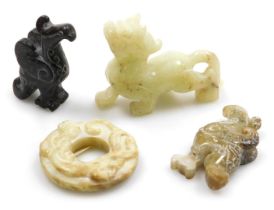 A group of Chinese jade and hardstone carvings. (4)