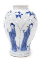 A Kangxi blue and white export porcelain vase, of fluted, baluster form, decorated with ladies, and