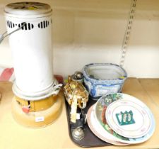 A small tin plated heater and ceramic items to include a large plate, blue and white ceramic planter