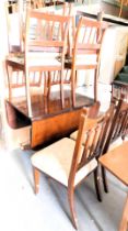 A drop leaf dining table and four dining chairs. This lot is located at our additional premises SALE