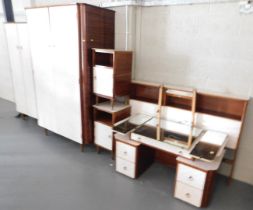 Two wardrobes, dressing chest, headboard and bedside tables. This lot is located at our additional p