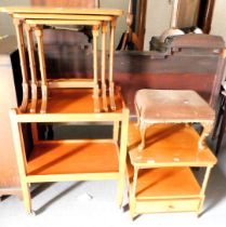 A nest of three tables, a tea trolley, small stool and a occasional table.