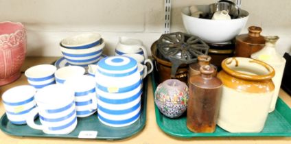 Cornish ware, biscuit barrel, tea cups, mugs, jug, bowls, metalware trivets, stoneware items includi