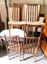 A oval extendable dining table and six dining chairs. (7) This lot is located at our additional pre