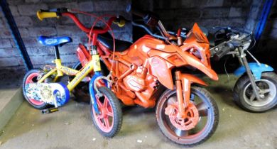 Two mini motorbikes, and a small child's bike.