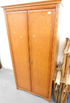 A two door veneer double wardrobe.