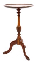 A mahogany wine table, with a baluster column, on tripod base, 65cm high, 39cm diameter.