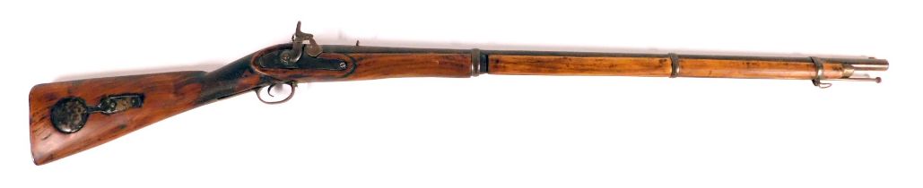 A 19thC Brown Bess type musket, with walnut stock, brass trigger guard and ring mount bindings, with