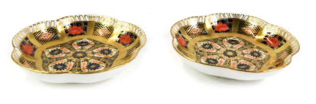 A pair of Royal Crown Derby Imari porcelain dishes, of five petal form, pattern 1128, 12cm wide.
