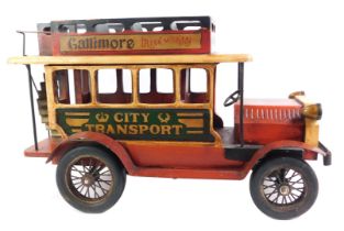 A Colin's Mustard wooden painted advertising City of Transport bus, 41cm high, 62cm wide, 29cm deep.