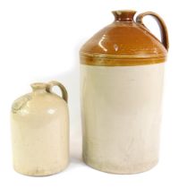 Two stoneware flagons, comprising a 19thC eight gallon flagon of two tone colouring, and a smaller e