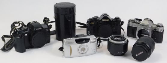 Camera and optics equipment, comprising a Canon A1 camera, Cameron AE-1 camera, Canon Super Shot, Ca