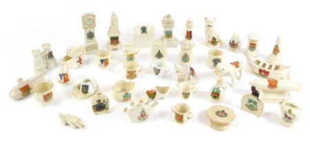 Swan and other crested china, to include an airship, Arms of Melton Mowbray, Queen Victoria statue o