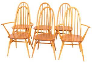A set of six elm and beech Ercol chairs, each with a turned spindle back, solid seat, on turned tape