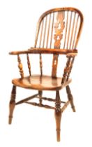 A 19thC elm and ash Windsor chair, with Christmas tree splat, scrolling arms and shaped seat, on