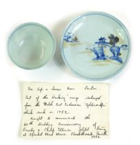 A Nanking Cargo tea bowl and saucer, of blue and white design, bearing label for Christie's 5194, th