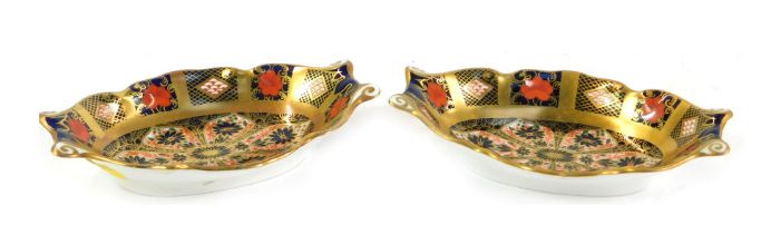 A pair of Royal Crown Derby Imari porcelain twin handled sweet meat dishes, of oval form, printed ma