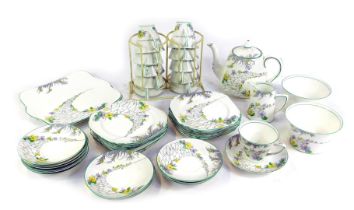 An early 20thC Heathcote china The Pathways pattern tea service, printed marks, comprising pair of b