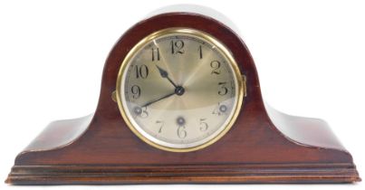 An early 20thC mahogany Napoleon hat mantel clock, silvered dial bearing Arabic numerals, eight day