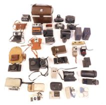 Camera and optics equipment, comprising a Kodak EK100 instant camera, IC3000 Hanimex camera, Halina