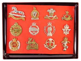 A group of military cap badges, to include 3rd King's Own Hussars, Tank Corps, Royal Berkshire Regim