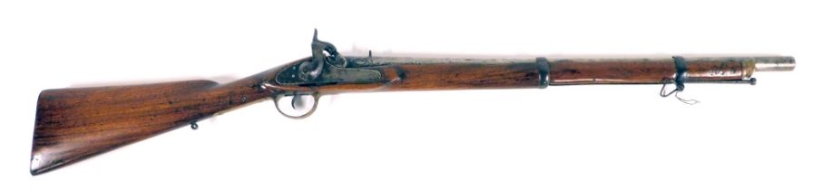 A 19thC percussion musket, with mahogany stock and brass trigger guard, with indistinct proof marks,