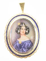 A late 19th/early 20thC portrait pendant/brooch, with a blue enamel outer border and petallated rim,