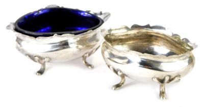 A pair of George V open silver salts, each of oval form with a fluted border, on tripod feet, Cheste