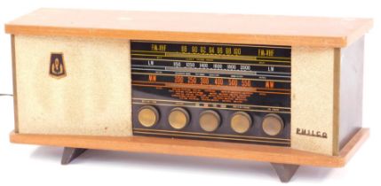 A Philco tabletop vintage radio, in teak case with glittered and panelled sides, 26cm high, 56cm wid