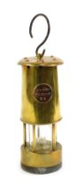 A LARM Mining Company copper and brass miner's lamp, 28cm high.