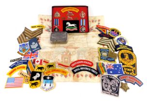 A group of military cloth badges and related items, for Royal Armoured Corps, 3rd Kings Own Hussars,