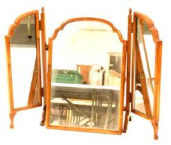 A walnut triple folding dressing table mirror, with arched top, 61cm high.