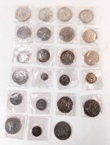 A group of replica Spanish and world coins, including Alfonso XII 1884, Isabelle 1860, 1855, a repli