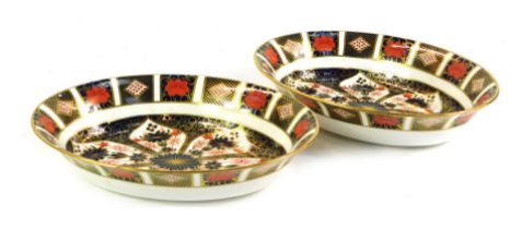 A pair of Royal Crown Derby porcelain Imari oval serving dishes, pattern 1128, 26cm wide.