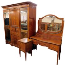 An Edwardian inlaid flame mahogany bedroom suite, comprising wardrobe compactum, with moulded corni