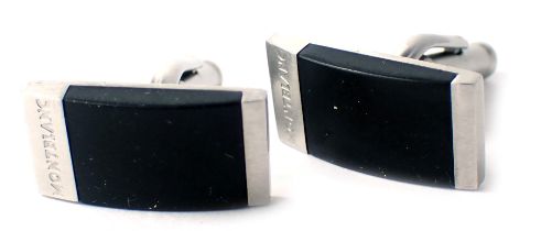 A pair of Montblanc gentleman's cuff links, each with a rubber black design, on stainless steel back