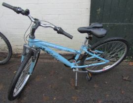 A Raleigh Explore bicycle, in pale blue trim.