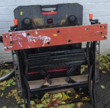 A work bench, and a mobile vice.