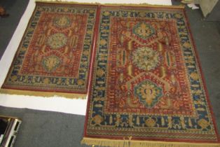 A group of machine woven rugs.