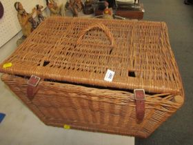 A wicker picnic hamper basket, of rectangular tapering form, 33cm high, 52cm wide, 39cm deep.