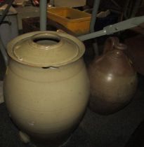 A stoneware flagon and another. (2)