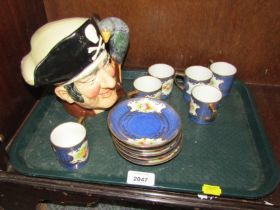 A Noritake coffee can and saucer set, and Royal Doulton large Long John Silver character jug. (1 tra