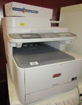 An Oki photocopy and printer, MC562W, together with a cartridge.