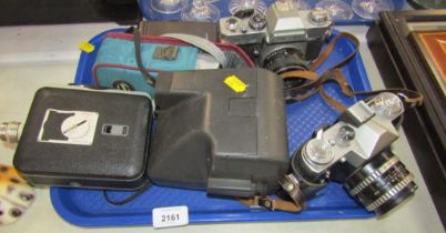 Various cameras, to include a Zenit - E camera, a Kodak Cine camera, Polaroid camera, etc. (1 tray)
