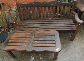 A teak garden bench, with slatted seat and back, 154cm wide, together with a teak garden table with