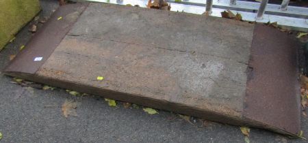 A wooden ramp, with metal ends, 136cm wide.