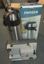 A Eumig mark 5010 projector, together with a Pioneer Vacuum Airport High Grade thermos.