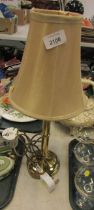 A brass table lamp base, with tapering shade, 50cm high overall.