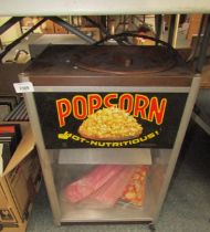 An electric popcorn machine.